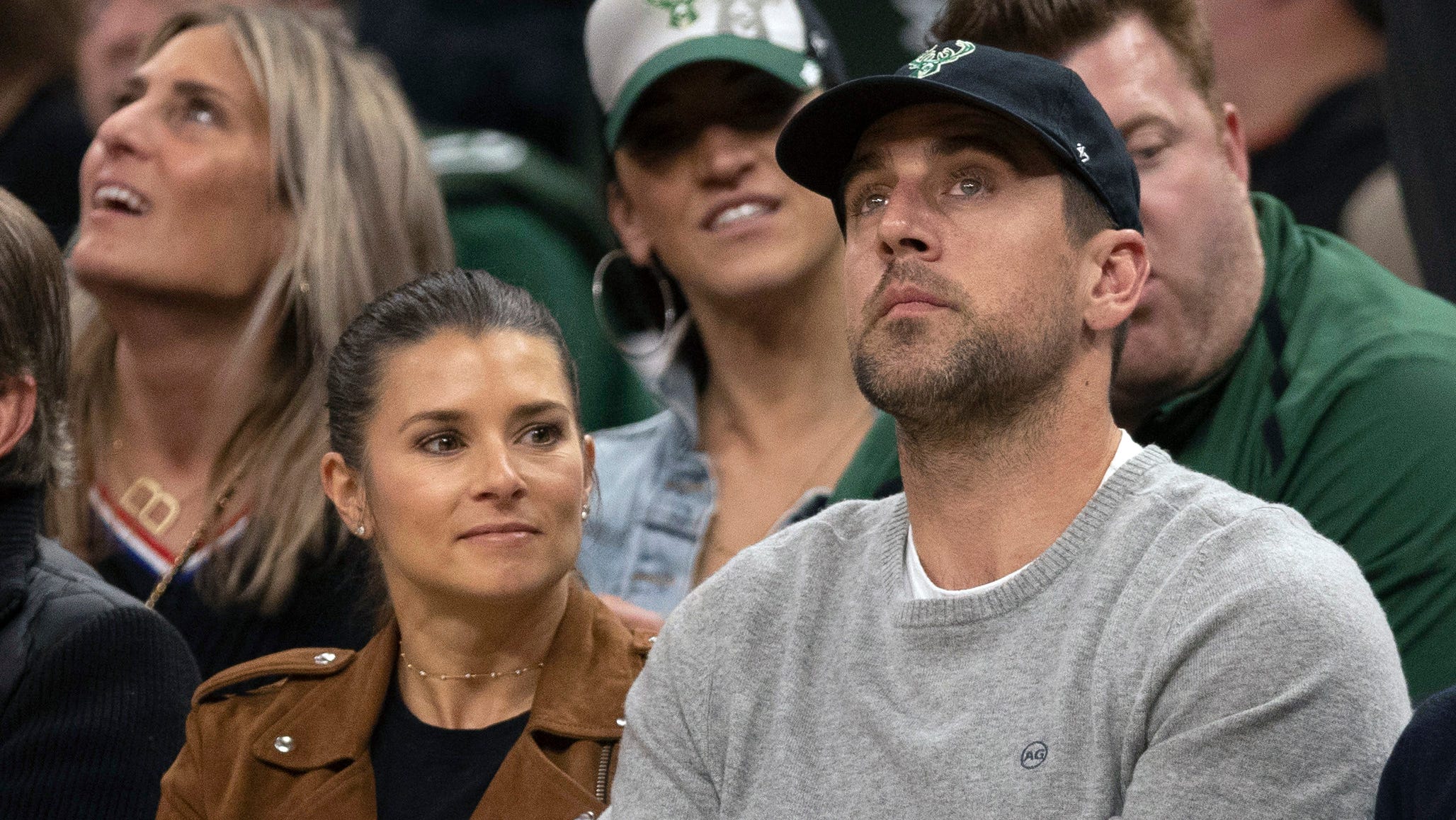 Aaron Rodgers reunites with coach Mike McCarthy and dismisses ex-girlfriend narratives ahead of season opener.
