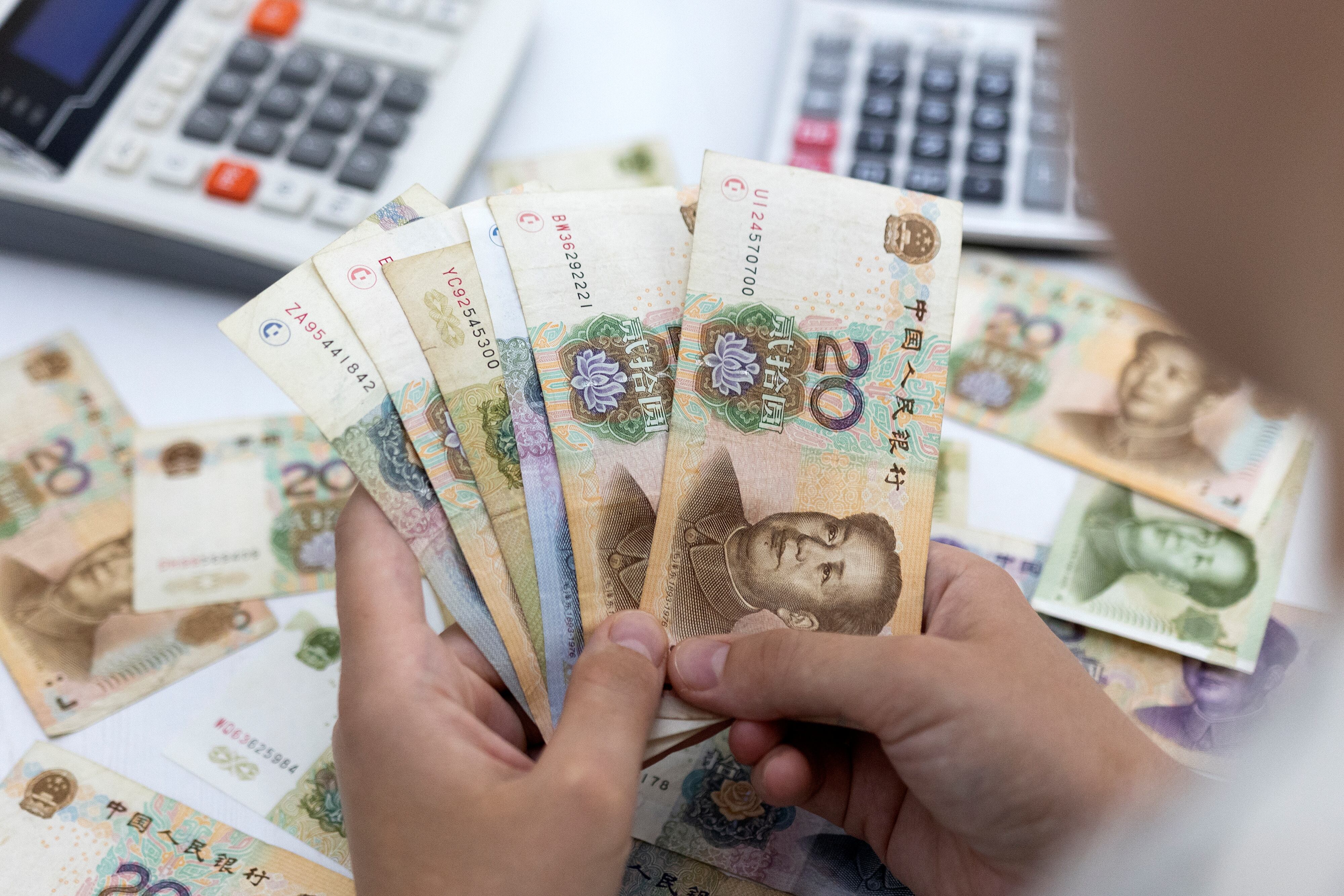 Yuan Hits Three-Year High, PBOC Eases Curbs