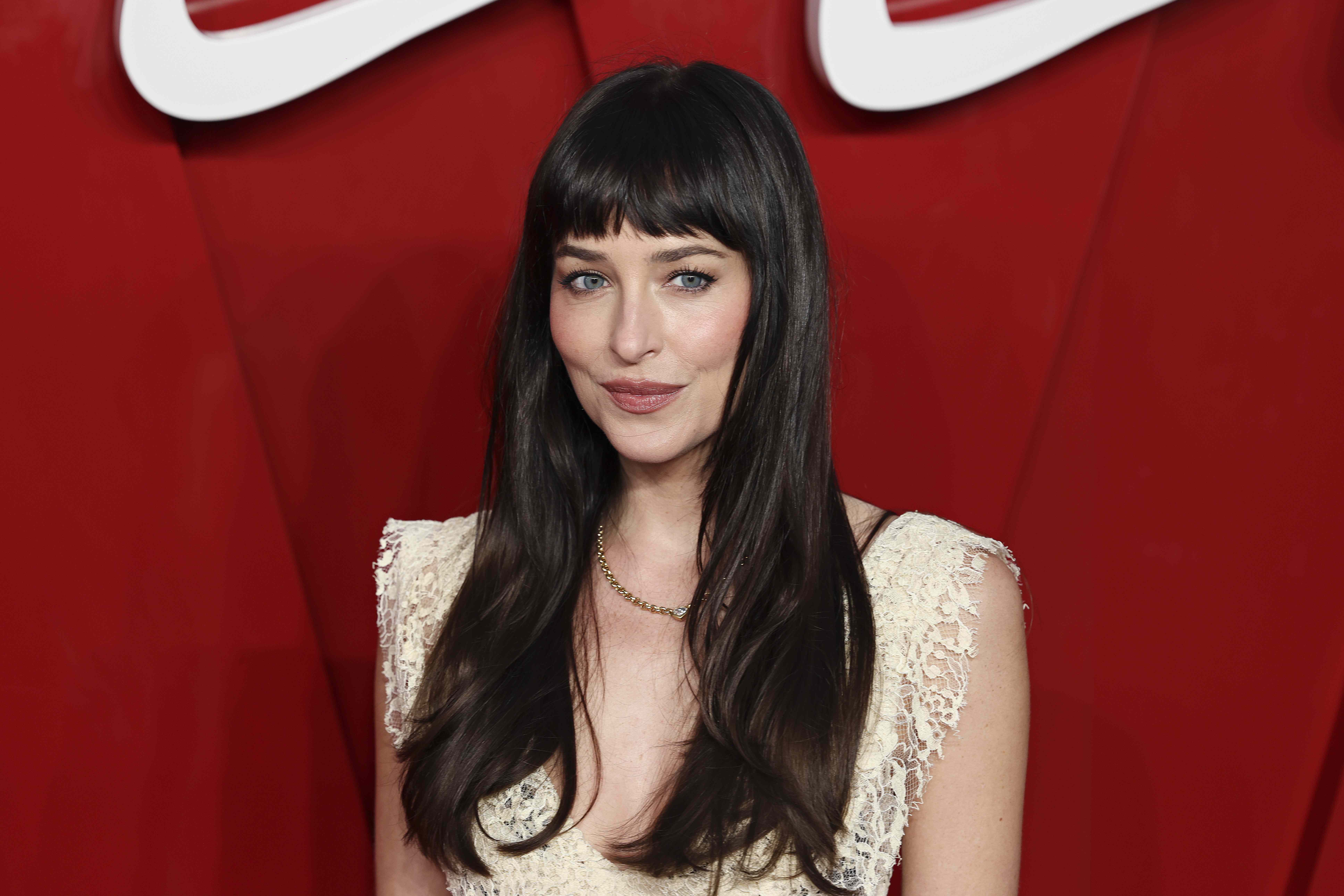 Dakota Johnson Wears Sheer Lace Gown to the London Premiere of Verity