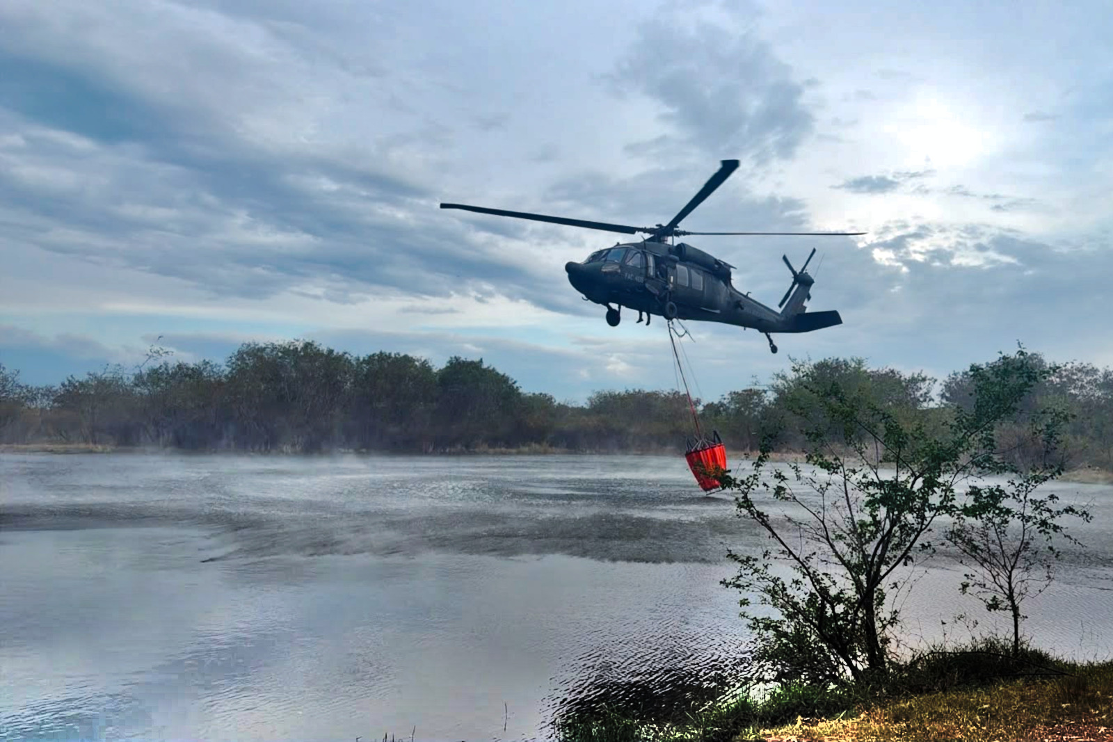Wildfire threatens historic Colombian tourist town as emergency crews battle growing flames