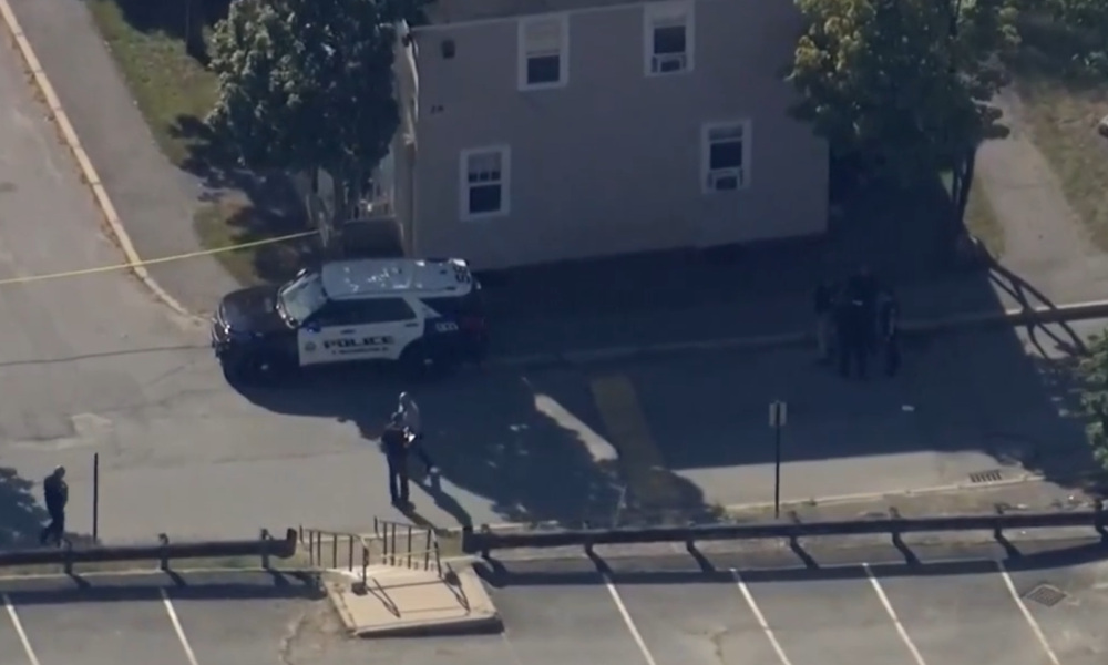 Three people were shot near Lawrence schools during dismissal, and police are actively searching for a suspect.