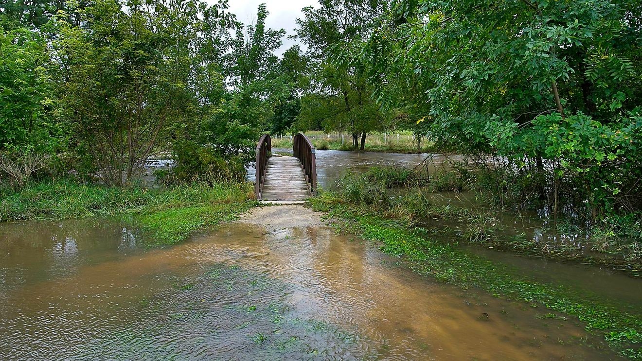 Storms Kill Three, Flood Communities Across Midwest, West