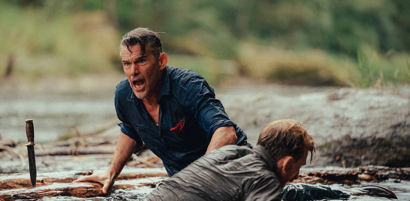 Ethan Hawke stars as a veteran leading convicts across the wilderness in Depression-era thriller.