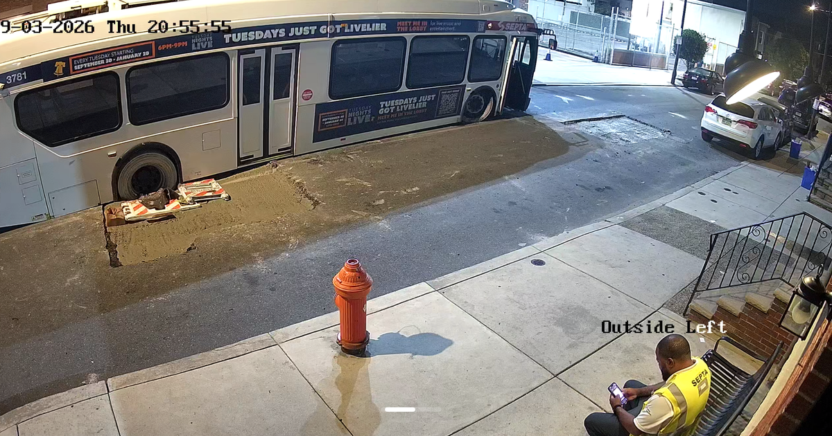 A SEPTA bus gets stuck in newly poured concrete outside a Philadelphia bakery.