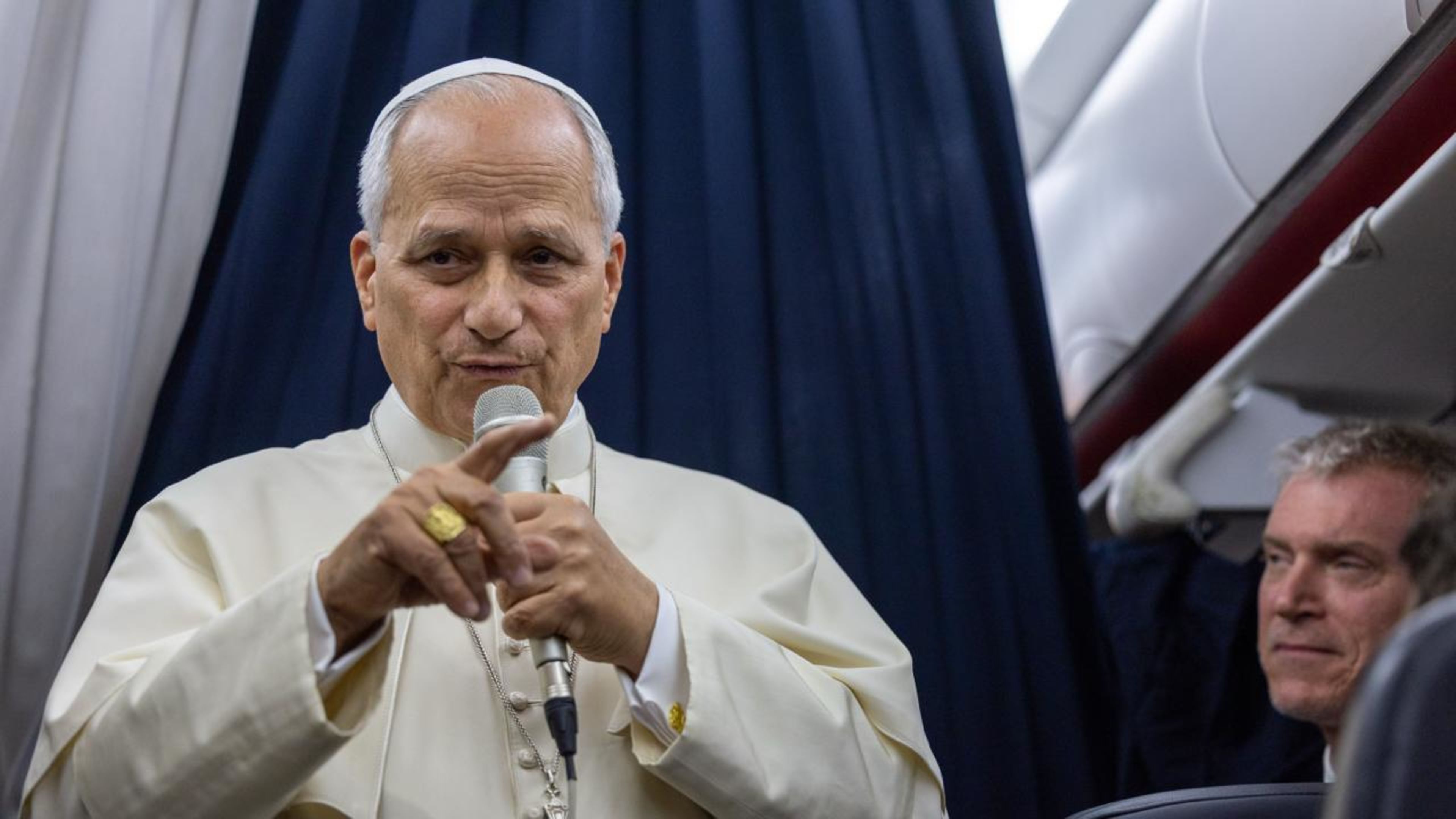 Pope Leo XIV urges global debate on AI risks, contrasting with political and tech leaders.