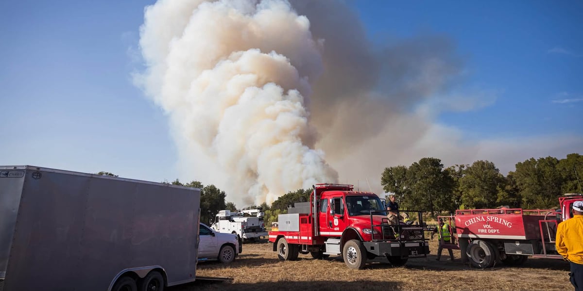 Wildfires burn across Texas and California as emergency crews battle difficult terrain.