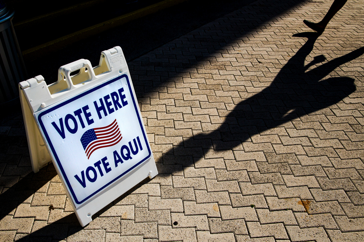Texas election officials process a massive voter registration backlog ahead of the deadline.