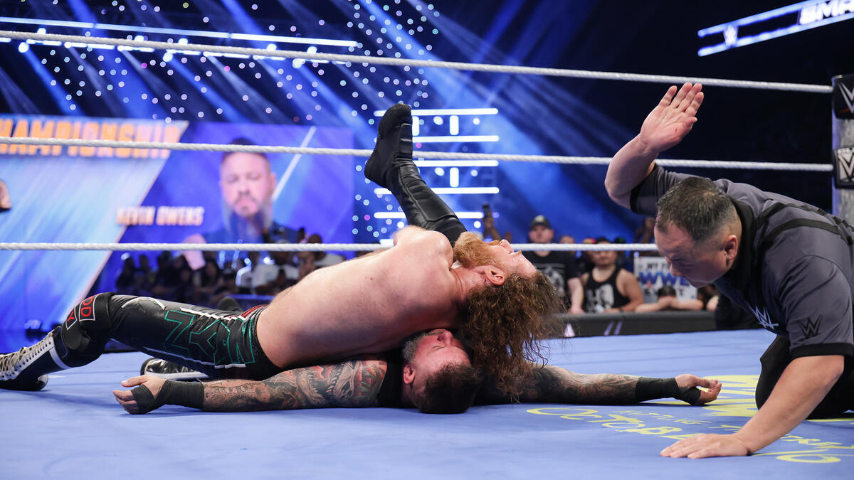 CM Punk Helps Sami Zayn Retain WWE Title
