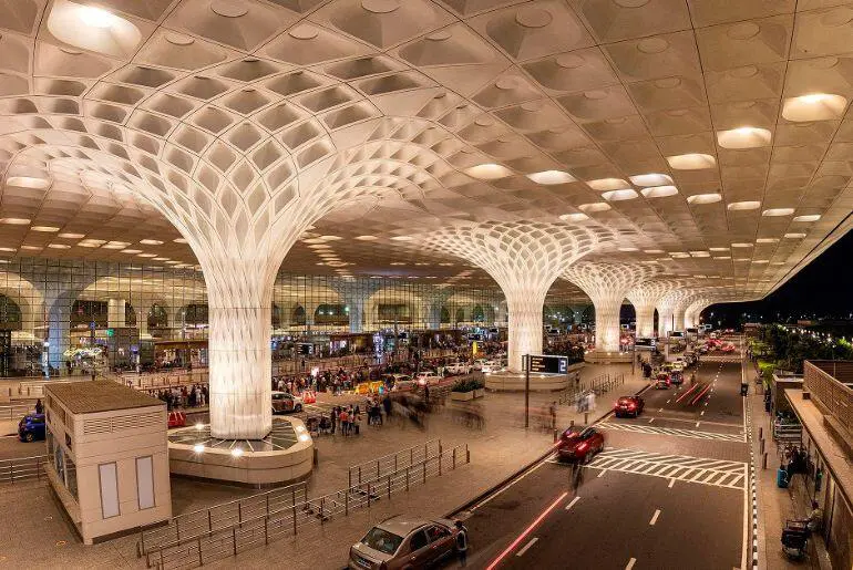Mumbai airport cuts weekly international flights to accommodate terminal redevelopment and domestic traffic.