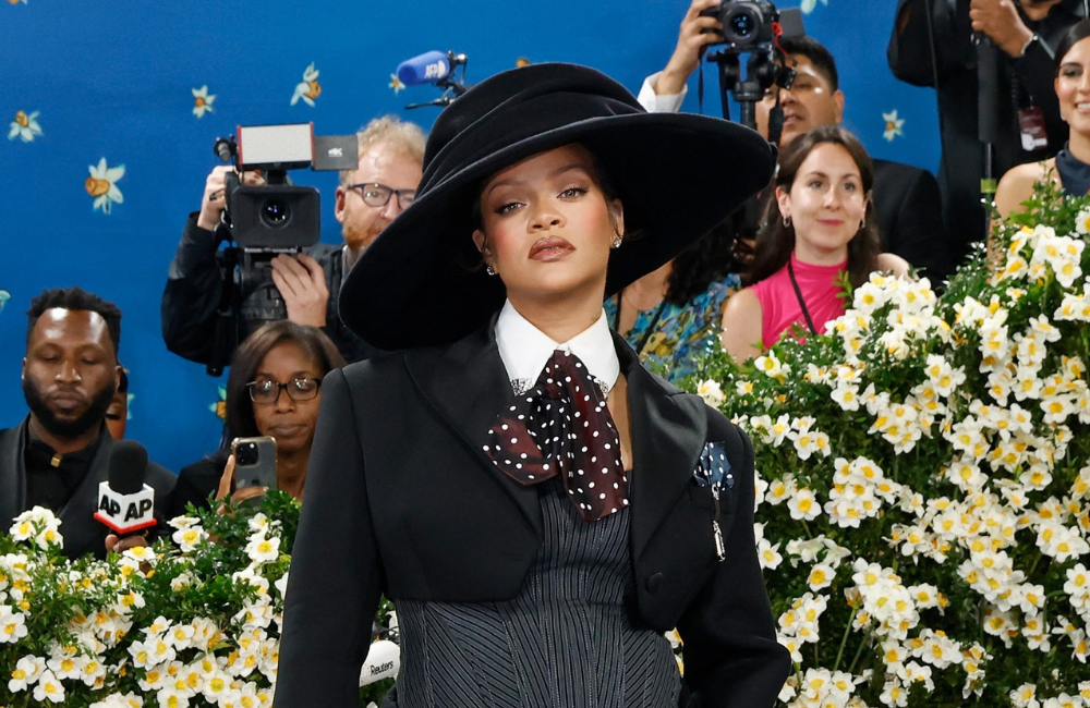 Rihanna Appears to Respond Online After EJ Johnson Criticizes Dior Show Delay