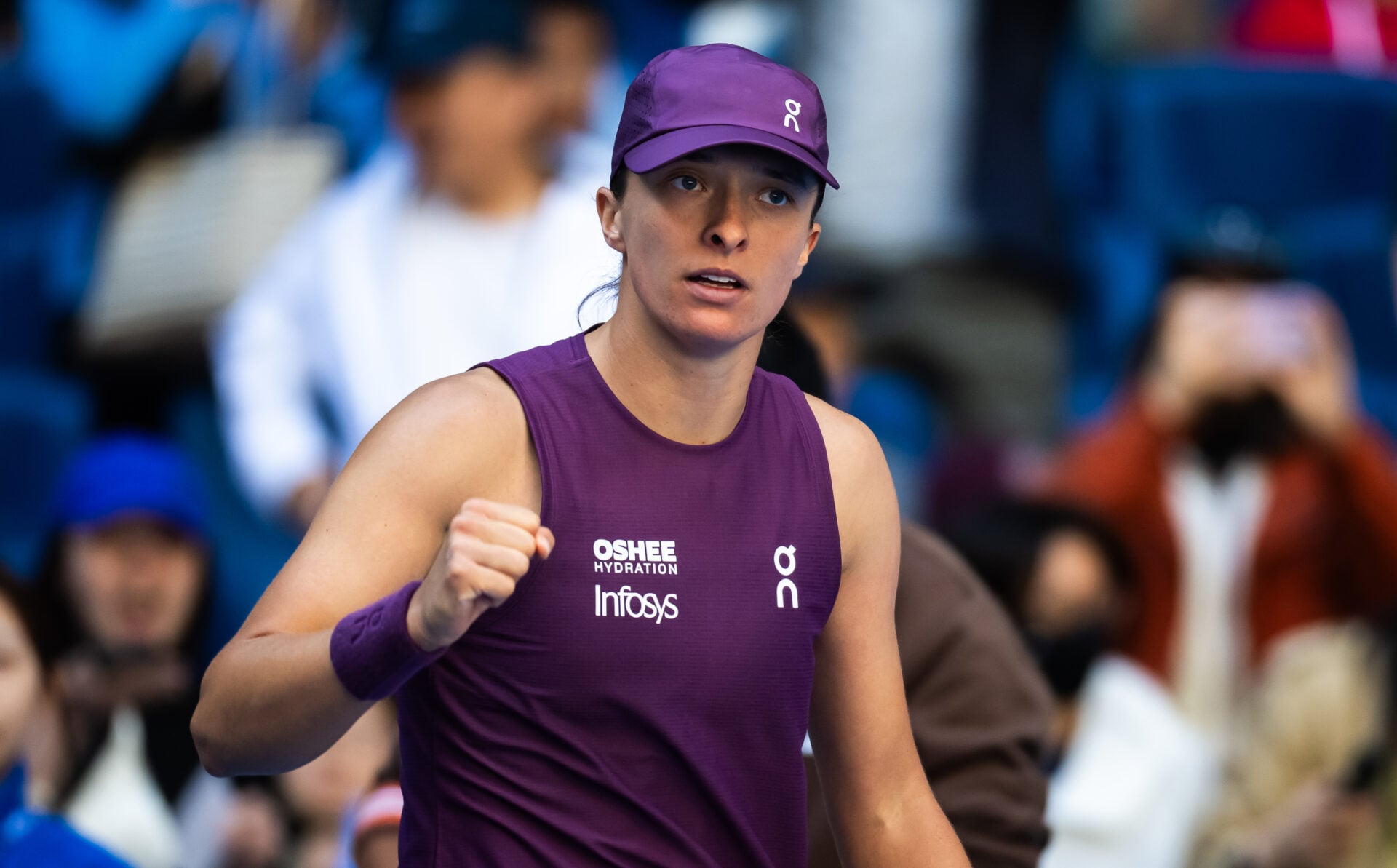Iga Swiatek overcomes a massive second set deficit to defeat Donna Vekic at the China Open.