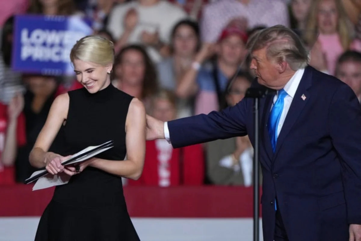 President Trump praises aide Natalie Harp and compares her during Nebraska rally.