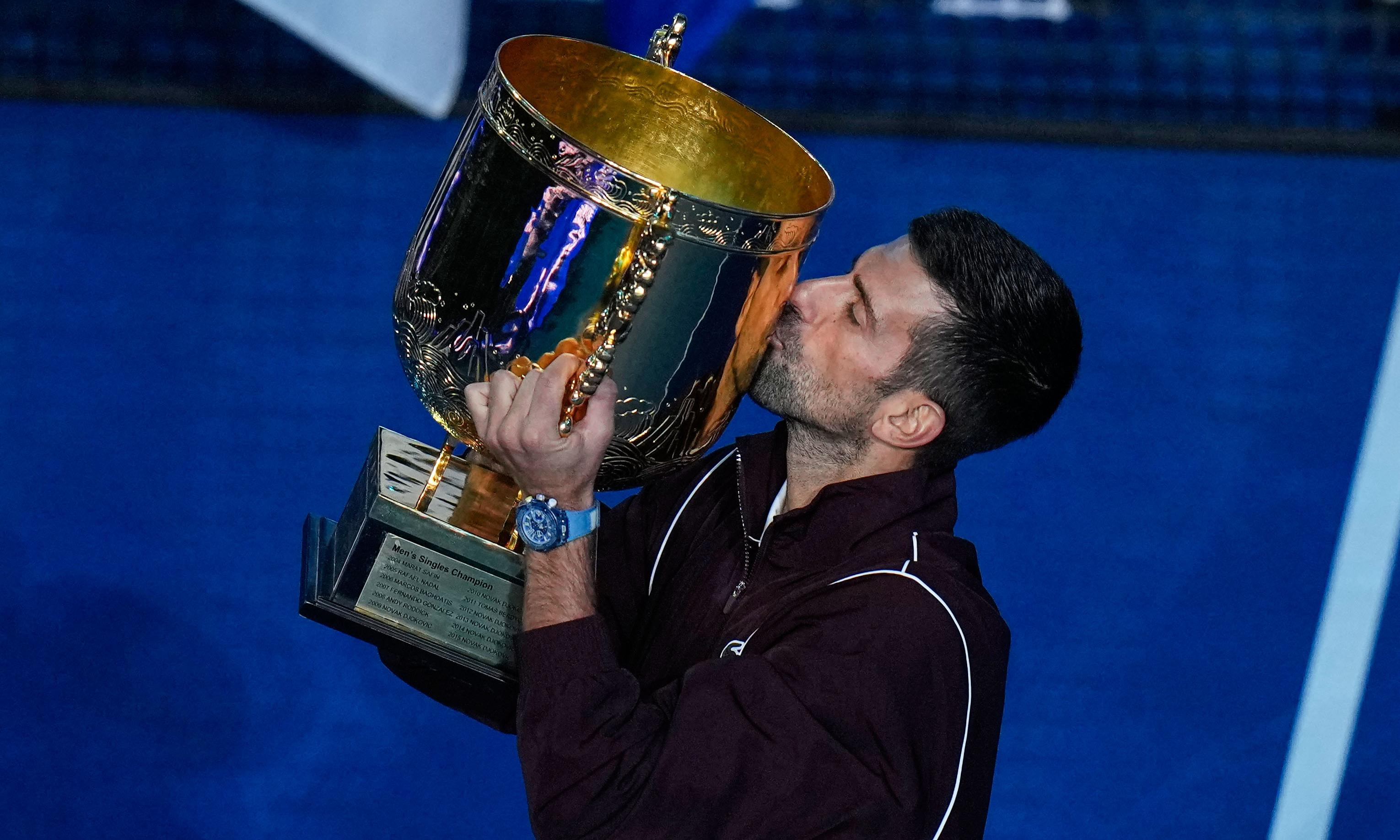 Novak Djokovic wins his 102nd career title after Alex de Minaur retires injured.