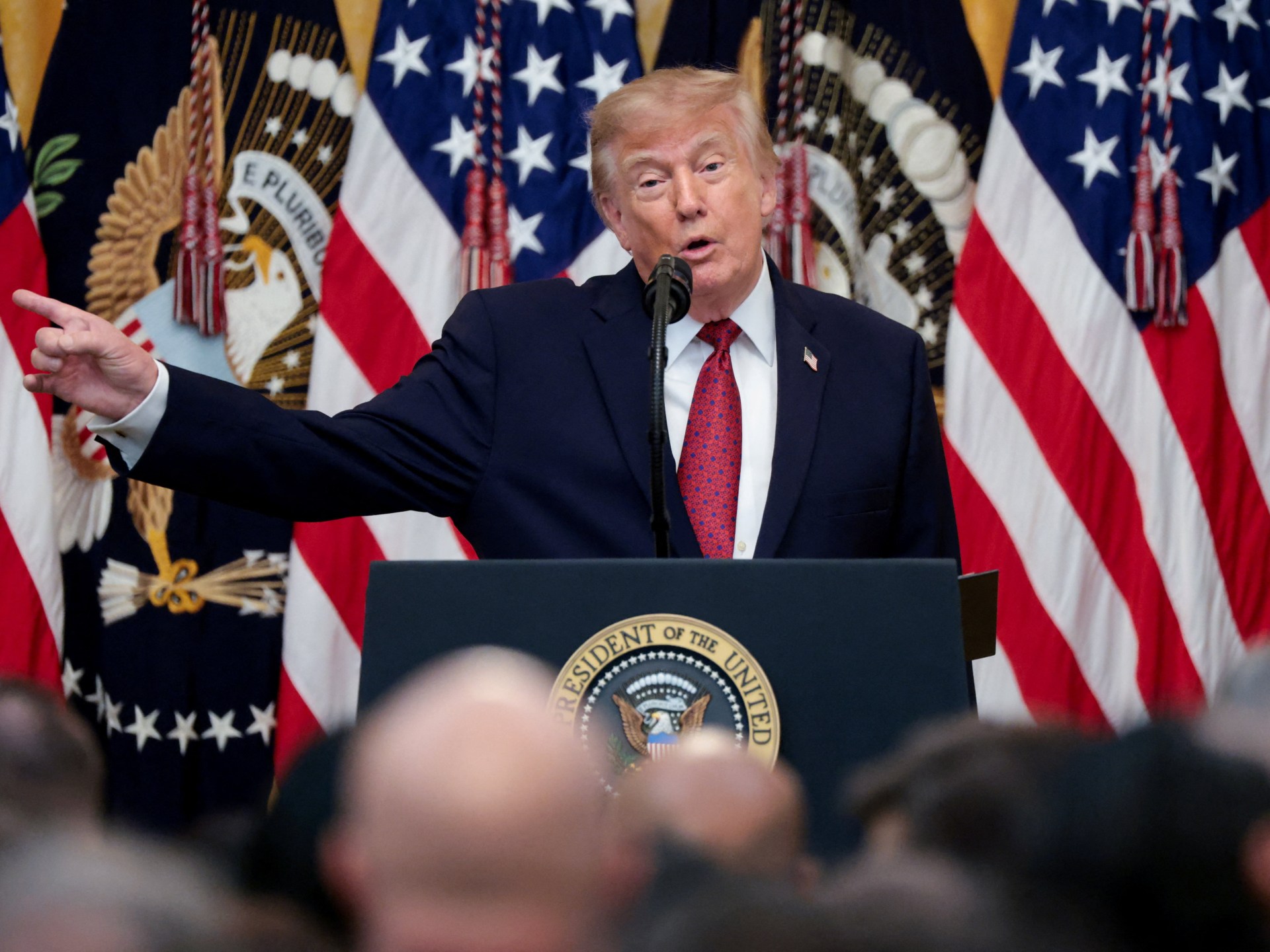Trump vows swift end to potential Iran conflict as thousands of US troops deploy.