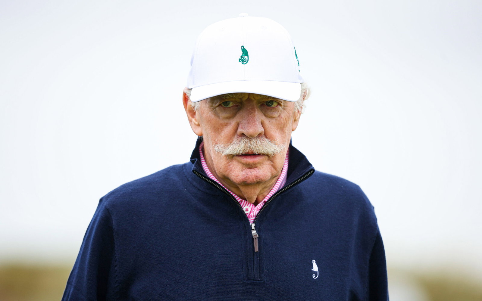Masked Celtic fans disrupt golf tournament by targeting Dermot Desmond with tennis balls