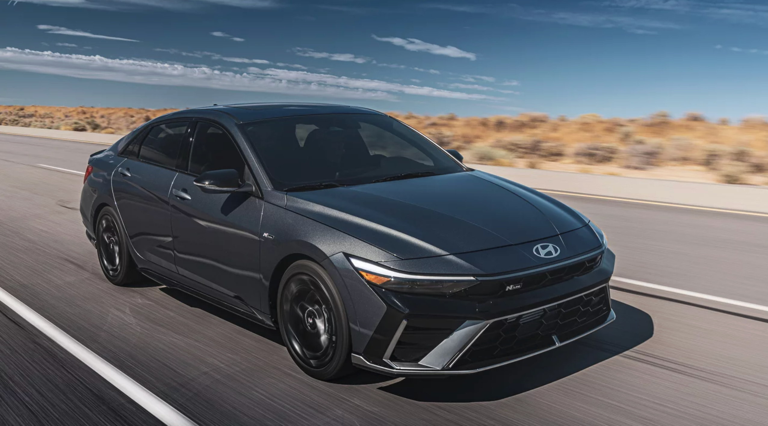 Hyundai dealers in California and Texas promote the fuel-efficient 2026 Elantra sedan.