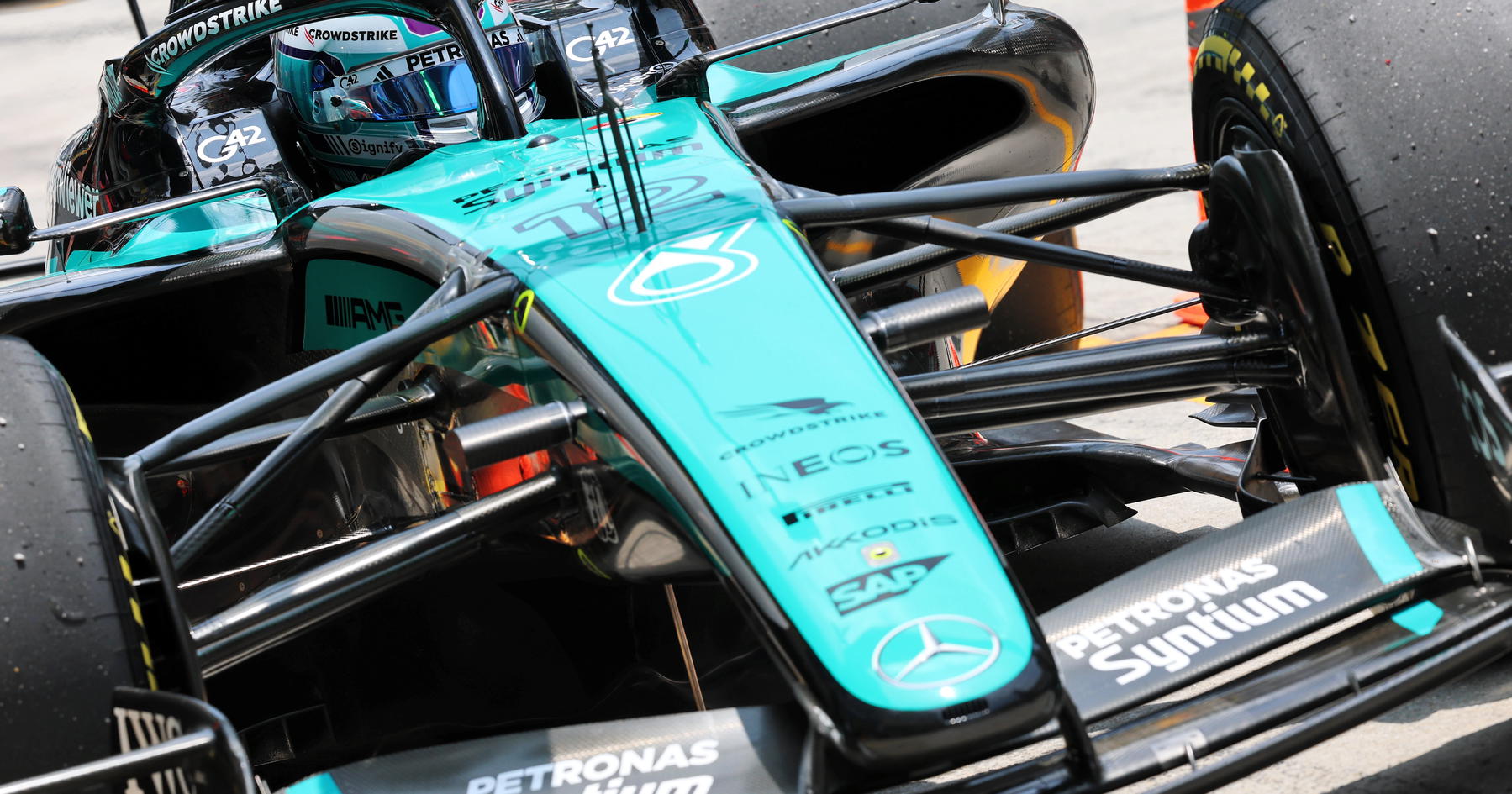 Mercedes battles severe tire overheating and setup struggles after major Sepang upgrade package.