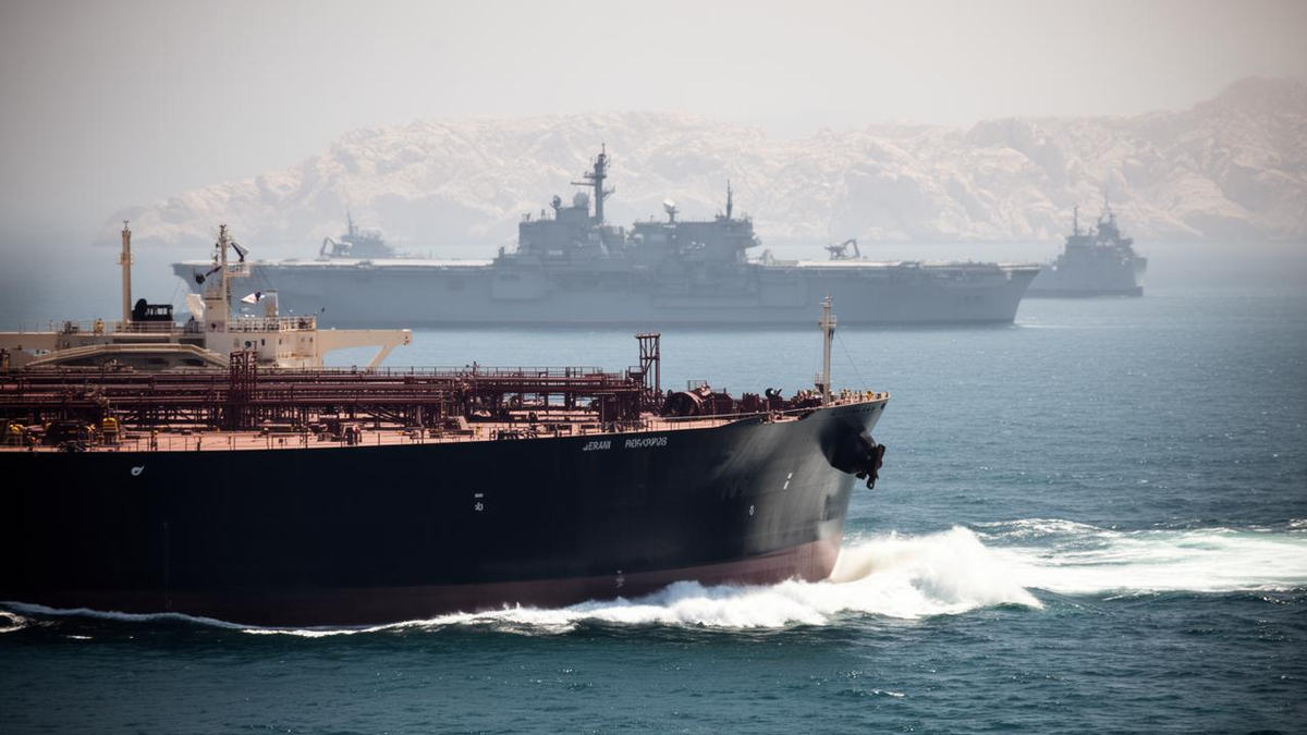 Three tankers struck by unidentified projectiles in the Strait of Hormuz.