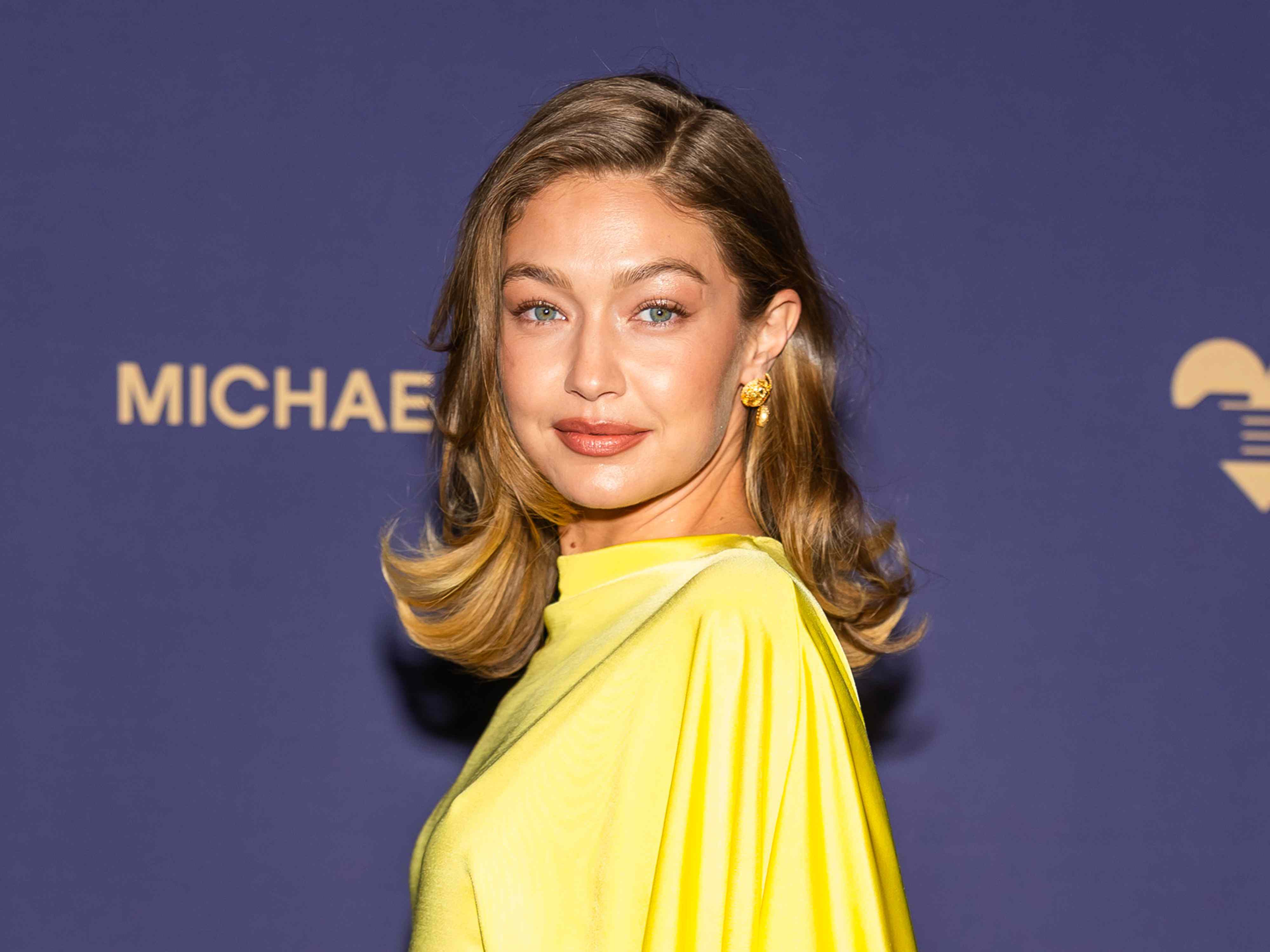 Gigi Hadid makes her Miu Miu runway debut during Paris Fashion Week.
