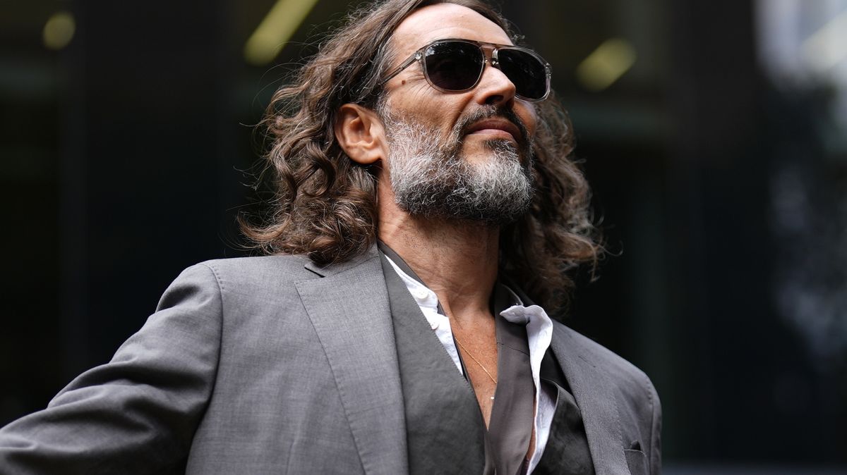 Russell Brand appears in court for pre-trial hearings ahead of sexual offense trial.